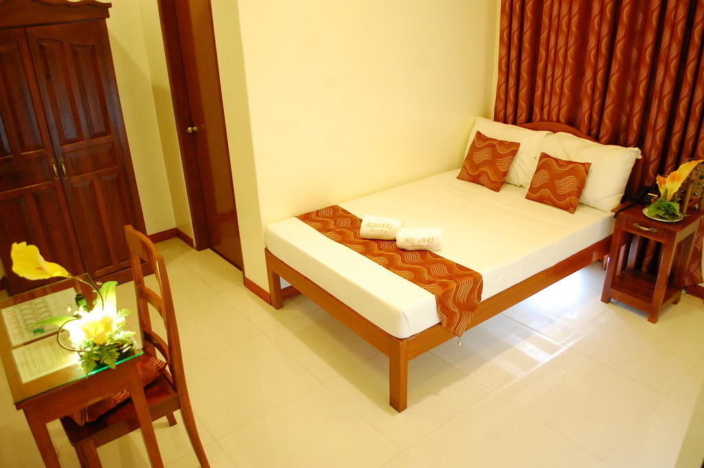 Aquari Travelers Suites Puerto Princesa Rum bild