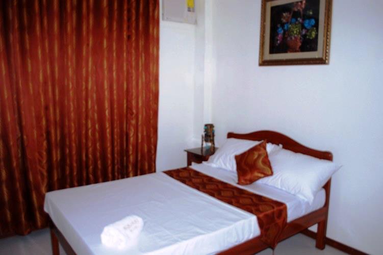 Aquari Travelers Suites Puerto Princesa Rum bild