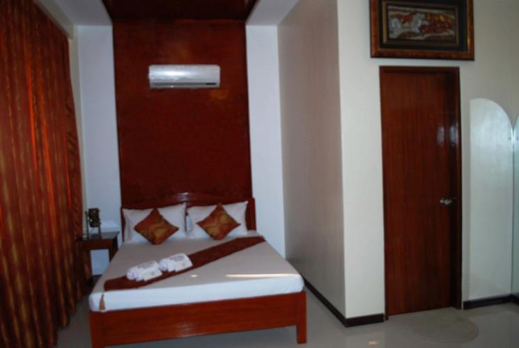 Aquari Travelers Suites Puerto Princesa Rum bild